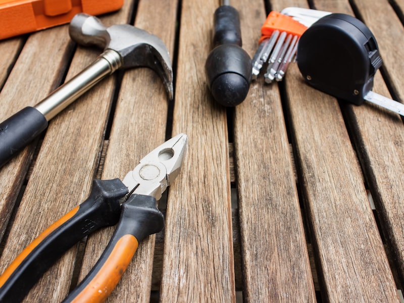 Professional hand tools laid out on a workbench