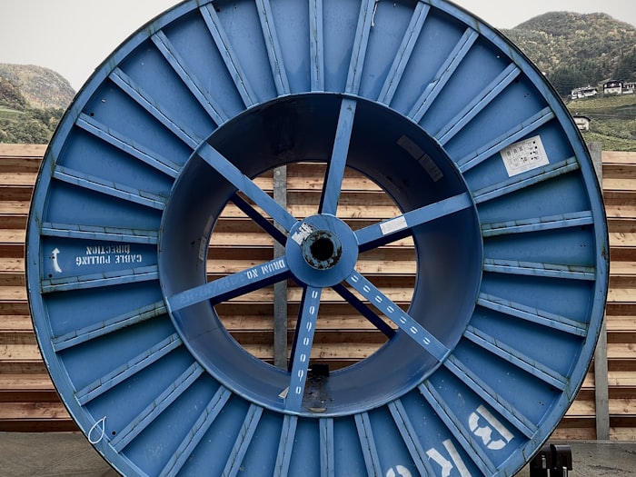 Industrial cable drum loaded with steel wire rope